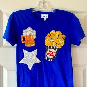 KOCH Sequin Tee with Popcorn, Beer, & White Star in Royal Blue. Size X-Small